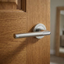 Manilla de zamak modelo '140' en acabado bicolor con Roseta Redonda para puertas de interior