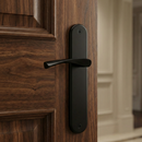 Manilla ola modelo '130' de zamak con placa ovalada acabado negro mate para puertas