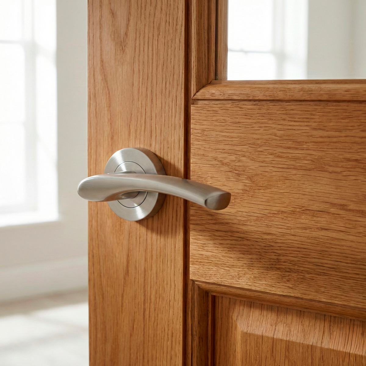 Manilla Hermes de aluminio con Roseta Redonda acabado níquel satinado para puertas