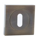 Bocallave de roseta cuadrada-redonda con boca oval acabado cuero para puertas