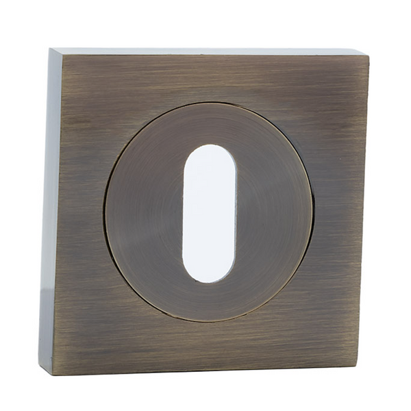 Bocallave de roseta cuadrada-redonda con boca oval acabado cuero para puertas