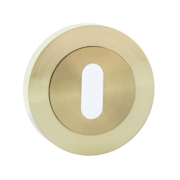 Bocallave roseta redonda oval en acabado dorado satinado para puertas