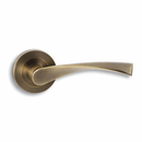 Manilla modelo 'ola 130C' con Roseta Redonda en acabado cuero para puertas