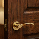 Manilla OLA de aluminio modelo '130' con Roseta Redonda acabado dorado brillo