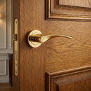 Manilla OLA de aluminio modelo '130' con Roseta Redonda acabado dorado brillo