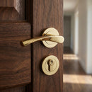 Manilla OLA de aluminio modelo '130' con Roseta Redonda acabado dorado brillo