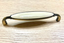 Tirador de cuero y porcelana para muebles y armarios 128mm entre ejes