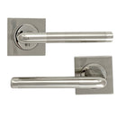 Juego de manillas con roseta cuadrada para puertas modelo 140A