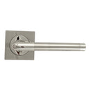 Manilla con roseta cuadrada para puertas en acabado níquel combinado