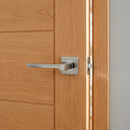 Manilla de zamak modelo 610 con roseta cuadrada en acabado níquel combinado para puertas