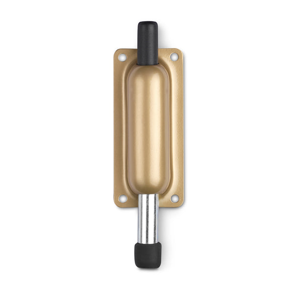 Robusto retenedor de puerta de acero acabado oro para accionar con el pie