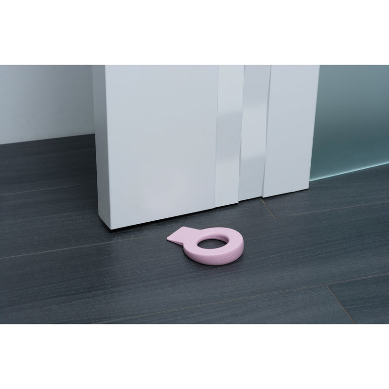 Cuña retenedor circular de plástico flexible acabado en rosa para puertas