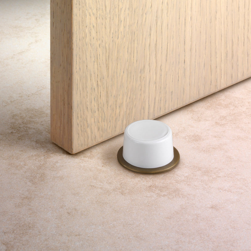 Beige plastic door stopper and flexible damper with screw included