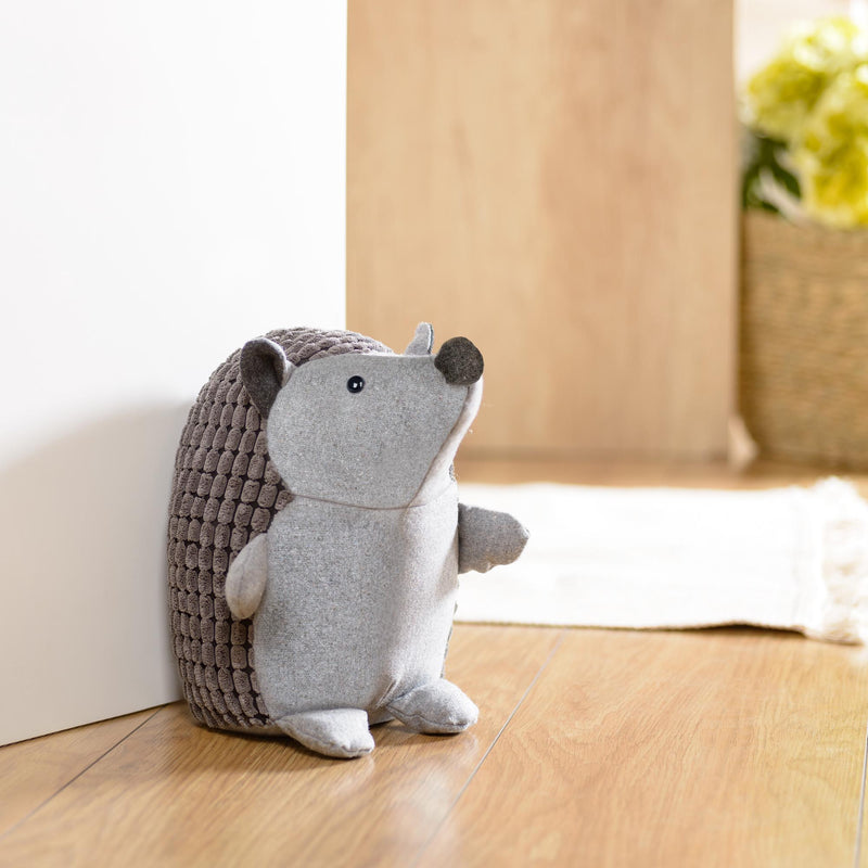 Gray hedgehog-shaped textile door retainer stopper