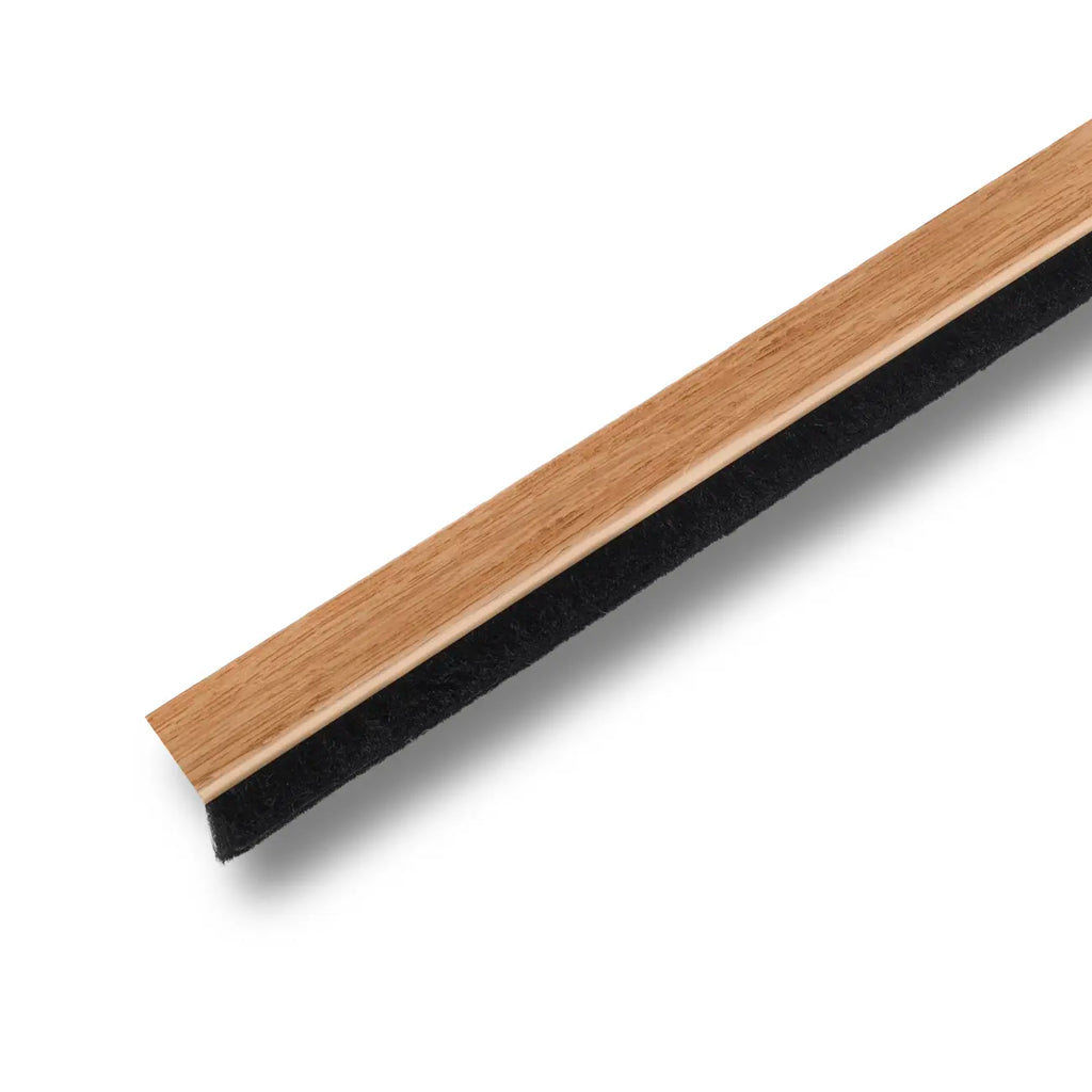 Perfil de burlete de 82cm autoadhesivo con cepillo para sellar el bajo  puerta en acabado madera clara